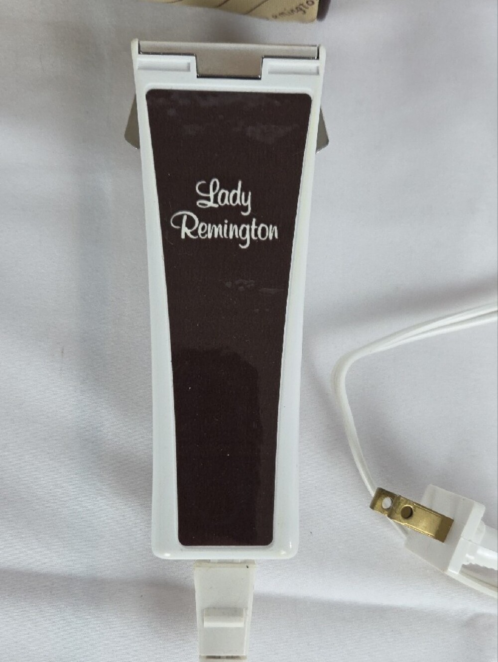 Remington Lady hair remover in white and brown